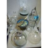 Various 20th century glass cheese domes; cake stands; a blown glass bell jar,