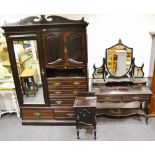 A Victorian three piece bedroom suite comprising compactum wardrobe,