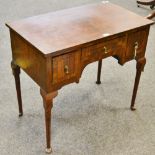 A mahogany and walnut lowboy, crossbanding to top and drawer fronts,