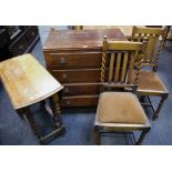 An early 20th century oak chest of four long drawers,