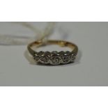 A five stone illusion set diamond ring,