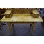 A Victorian Style pine wash stand shaped gallery and two short drawers,