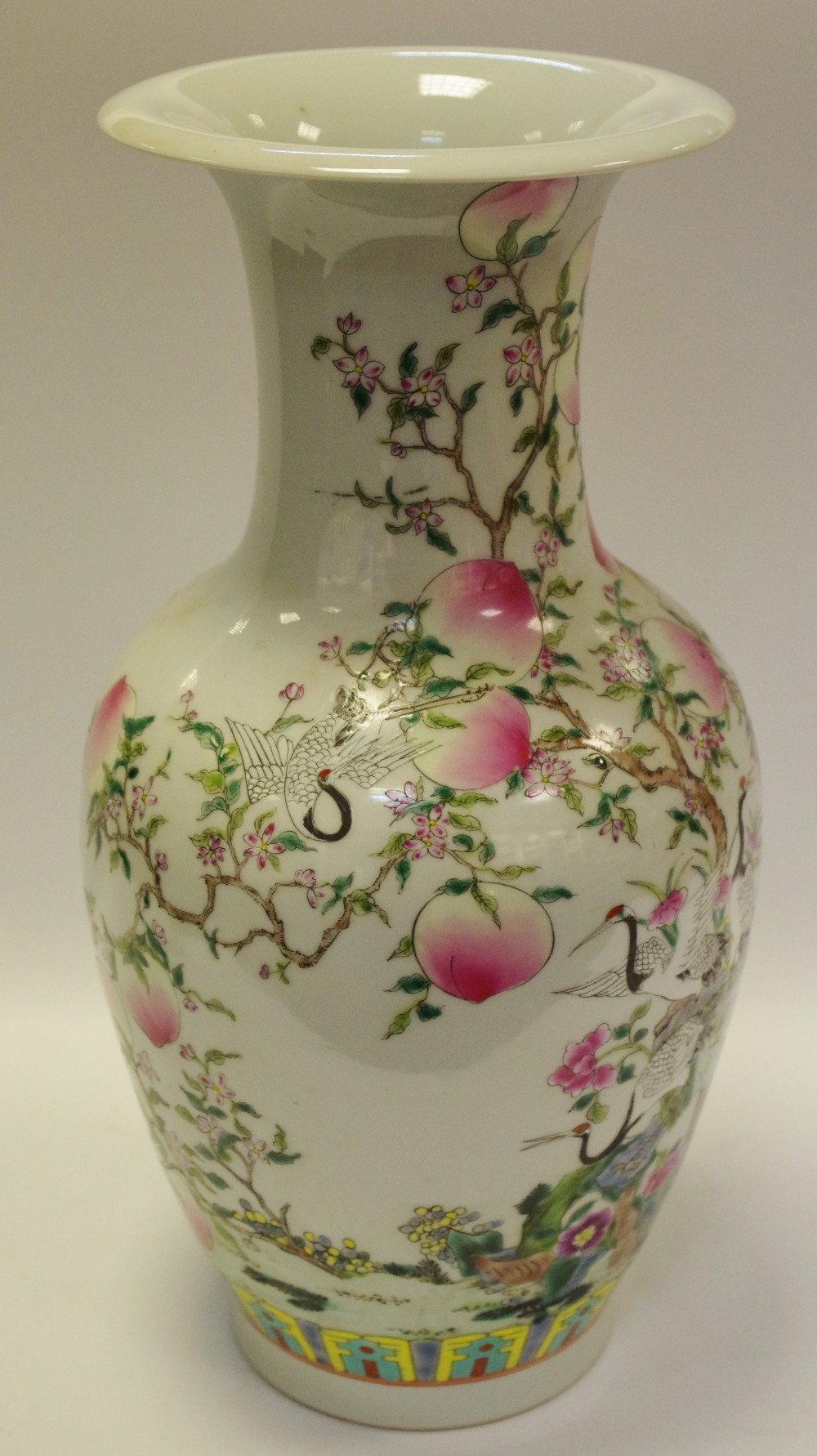 A Chinese ovoid vase, decorated in polychrome enamels,