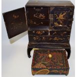 A Chinese miniature cabinet on stand,