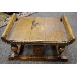 A late 19th Century oak prayer stool upturned side rails turned supports