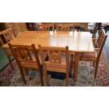 A Peter 'Dinky' Daynes (Dolphinman) walnut dining table,