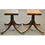 A pair of Regency mahogany table pedestals turned columns fluted sabre legs brass terminal and