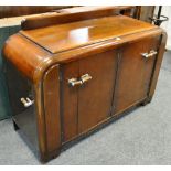 An Art Deco shaped sideboard, chromed handles,