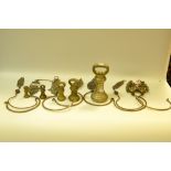 Four pairs of brass Oriental mosquito net hooks;