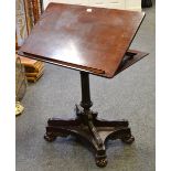 A 19th century Irish mahogany architect's table, the reeded top adjustable on a ratchet,