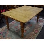 A farmhouse pine kitchen table.