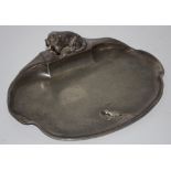 A WMF card tray, as a dachshund watching a lizard, model no. 369, ostrich mark, c.