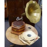 A His Master's Voice gramophone and records.