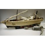 A mid 20th century boat pond yacht, Mary Rose, 88cm long; a boat anchor,