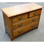 A red walnut chest of two short drawers over two long