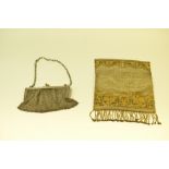 An early 20th century silver mesh purse;