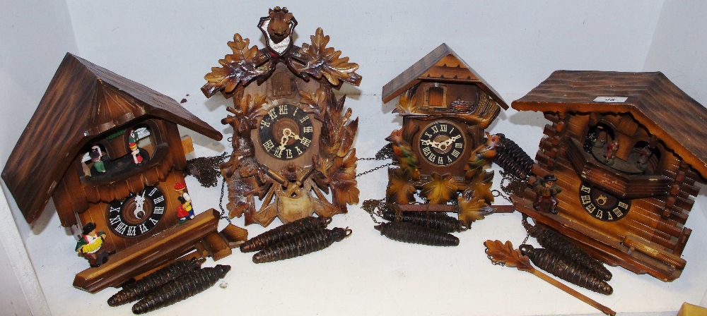 Four Black Forest cuckoo clocks,