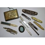 A collection of 19th century and later pen knives; a gilt metal mounted pin cushion,