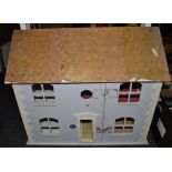 An early/mid 20th Century dolls house
