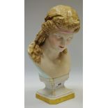 A late 19th century porcelain bust of a classical lady, olive branch head piece,