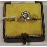 An 18ct gold and diamond cluster ring,