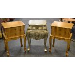 A pair of gilt effect bedside drawers, serpentine front, two drawers, cabriole legs; another,