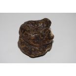 A novelty Victorian papier mache snuff box in the form of a dog poo c.