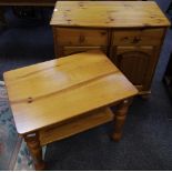 A modern pine bow front side cabinet two short drawers over two door cupboards; a pine side table,