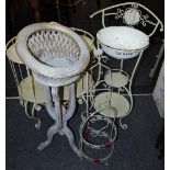 A wrought iron and tubular steel washstand with enamel basin; a wrought iron two tier shelving unit;