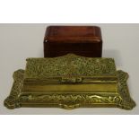 An early 20th century cast brass stamp box;
