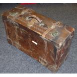 A substantial early 20th century leather suitcase