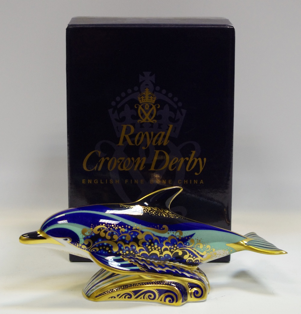A Royal Crown Derby paperweight, Bottlenose Dolphin, first quality, gold stopper,