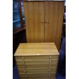 A mid 20th century satin teak A C furniture gentleman's wardrobe,