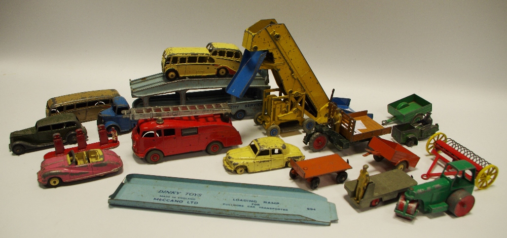 A Dinky Fire Engine no. 555; Bedford Pullmore Car Transport no. 582 with Loading Ramp no.