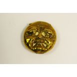 A 19th century brass novelty vesta case, as a comical face, happy, and sad to verso, hinged cover,