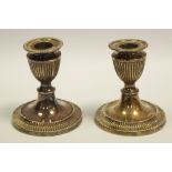 A pair of Victorian silver candlesticks, James Dixon & Sons,