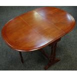 A yew wood gateleg occasional table,