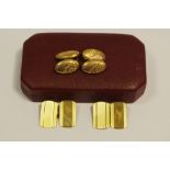 A pair of cased 9ct gold cufflinks; another 9ct pair (5.