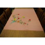 An Oriental Silk table cloth, embroidered with colourful flowers,