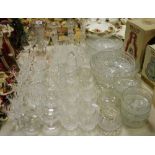 Glassware - a pair of cut glass candlesticks; set of six cut glass Waterford type tumblers;