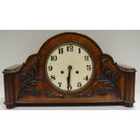 An large early 20th century oak and walnut mantel clock with applied floral swags c.