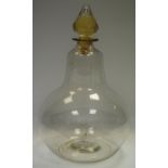 A 19th century blown glass gourd shaped apothecary jar with unusual liquid filled stopper