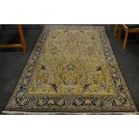 A fine Persian hand made Qum carpet 261cm x 158cm