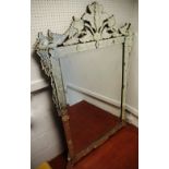 A substantial Venetian style wall mirror, profusely etched throughout, c.