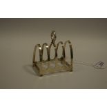 A George VI silver five bar toast rack,