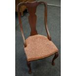 A Queen Anne style mahogany chair shaped top rail,