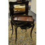 An ebonised gentleman's dressing table hinged top opening to mirror and lift out compartmented tray,