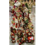 Christmas Decorations - various models of Santa Claus in different poses