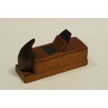 Treen - A 19th century mahogany snuff in the form of a smoothing plane