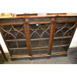 A George III mahogany break front bookcase